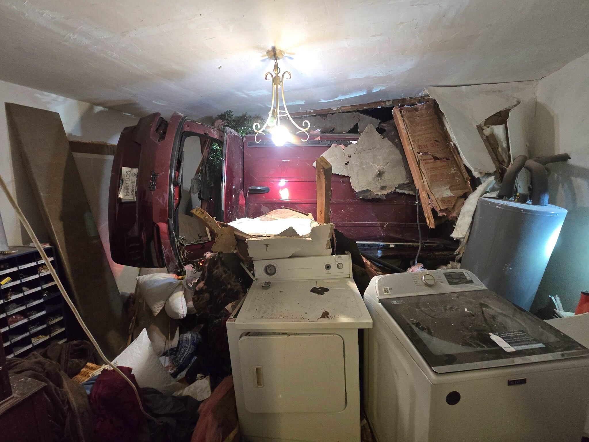 Driver critically injured after Jeep crashes into Eloy home