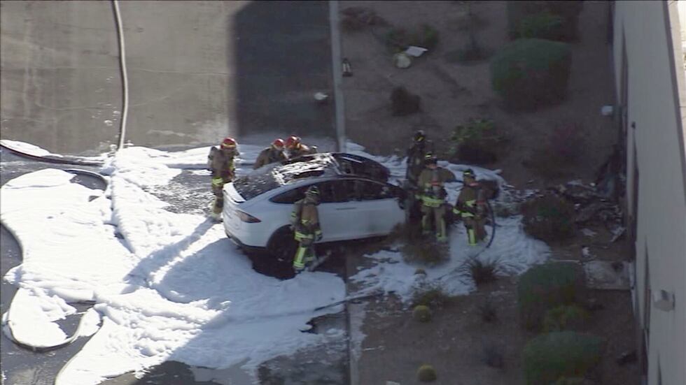 Firefighters quickly put out the car fire after the crash.