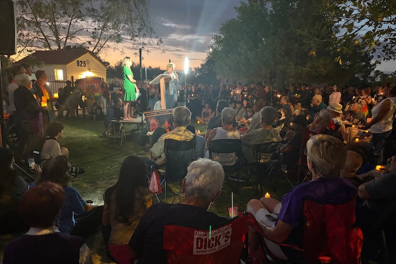 Community holds vigil for victims of Tucson hate crime
