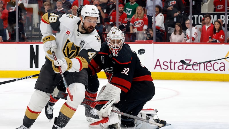 Carolina Hurricanes goaltender Brandon Bussi (32) watches the puck with Vegas Golden Knights'...